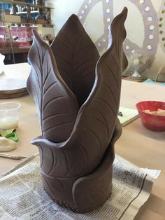 there is a vase made out of chocolate