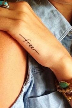 a woman's arm with the word hope tattooed on her left arm and an arrow tattoo