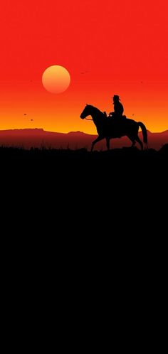 the silhouette of a person riding a horse in front of an orange and red sky