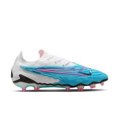 a white and blue soccer shoe with pink accents