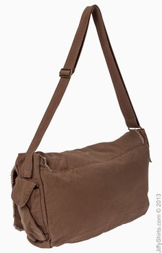 100% cotton canvas; Adjustable cotton webbing shoulder strap with antique brass slider and D-ring; Exterior and interior zippered pockets; Large flap with magnetic snap; Enzyme-washed; Side pockets Waxed Finish Shoulder Bag For On-the-go, Distressed Brown Waxed Finish Shoulder Bag For Daily Use, Vintage Brown Waxed Canvas Shoulder Bag, Vintage Distressed Brown Bag With Waxed Finish, Distressed Brown Waxed Finish Shoulder Bag, Wholesale Clothing, Raw Edge, D Ring, Unique Charms