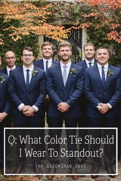 a group of men in suits standing next to each other with the words q what color tie should i wear to standout?