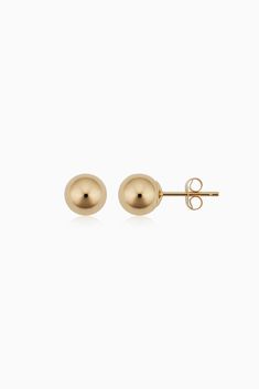 Have a ball while adding a touch of shine and sophistication to any outfit with these gorgeous gold ball studs. Have more than one piercing? Perfect! Our ball studs pair well with friends. Metal: 14k Solid Yellow Gold Sizes: Available in 4mm, 6mm and 8mm Closure Type: Push Back Posts Crafted in Massachusetts, USA Classic Gold Earrings With Round Beads, Gold Ball Earrings, Jewelry 2024, Ball Stud Earrings, White Tights, Ball Earrings, White Headband, French Girl, Brown Dress