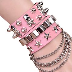 Punk E-Girl Bracelets Layered emo punk/metal style bracelets with studs, skulls, stars and chains! A great accessory for gigs and festivals. Wear them all together or separately. Length: 8.5"/21.6cm Material: Faux Leather & Metal. Closure: Adjustable Stud Clasp. Leather Goth, Emo Accessories, Pastel Punk, Pink Goth, Boho Princess, Goth Accessories, E Girl, Kawaii Accessories, Wide Bracelet