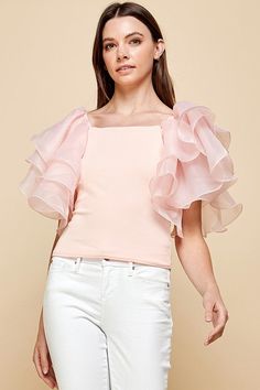 Refresh your wardrobe with this exquisite women's casual blouse. Cut from luxuriously soft fabric and finished with layered ruffles and short sleeves for a chic effect. A perfect statement piece for any special occasion or a casual day out. Peach color Layered Ruffles Short Sleeves Trendy Flutter Sleeve Top For Summer, Trendy Short Sleeve Top With Flutter Sleeve For Summer, Trendy Summer Short Sleeve Top With Flutter Sleeves, Chic Summer Blouse With Ruffle Hem, Summer Feminine Blouse With Ruffle Sleeves, Feminine Summer Blouse With Ruffle Sleeves, Chic Fitted Ruffle Blouse, Chic Summer Blouse With Ruffle Sleeves, Chic Fitted Blouse With Ruffles