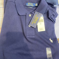 Polo Ralph Lauren Brand New Polo Shirt Navy Blue Custom Slim Fit Blue Polo Shirt With Polo Collar, Blue Polo Shirt For Workwear, Blue Short Sleeve Polo Shirt For Workwear, Blue Short Sleeve Polo Shirt For Work, Casual Blue Collared Top, Blue Polo Collar Shirt For Work, Blue Polo Collar Workwear Shirt, Blue Collared Polo Shirt For Spring, Blue Long Sleeve Polo Shirt For Work