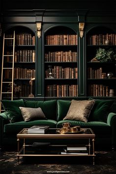 a living room with green couches and bookshelves