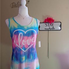 Pastel Tie-Dye Tank Top Size Xl But Definitely Fits More Like A Large!! Pit To Pit 20" Length 25" The Front Has A White Heart With The Word "Love" Inside The Heart Super Cute Material 60% Cotton 40% Polyester #Tie Dye Bra Friendly #Pink #Love Bella Rosa Boutique Shop Fun Tie Dye Tops For Summer, Fun Tie Dye Summer Tops, Multicolor Casual Tank Top For Loungewear, Casual Multicolor Tank Top For Loungewear, Multicolor Bleached Tops For Spring, Multicolor Tank Top For Summer Loungewear, Summer Fun Tie Dye Tops, Spring Multicolor Bleached Tops, Casual Ombre Tops For Summer