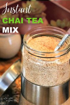 a glass jar filled with chafea mix on top of a counter next to a spoon