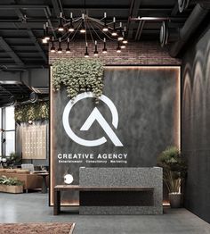 an office lobby with a large sign that says creative agency on the wall and plants growing out of it