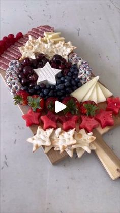 an american flag made out of fruit and cheese