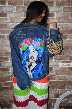 "Hand painted denim Jacket with painting Jacket with art work on it Art on Denim jean Jacket with pop-art Girl in wreath Flowers on the head This jacket is sold, I can draw for you any other drawing. Write me a personal message on Etsi, and we'll arrange everything. Choose the size of the jacket and design of the jacket, we can in personal correspondence to Etsy. The design consists on a hand painted illustration on the back. I used acrylic and textile paint, so don't worry, it won't come off wh Blue Denim Jacket With Custom Artwork For Spring, Artistic Blue Denim Jacket For Spring, Spring Hand Painted Denim Jacket, Artistic Hand Painted Blue Denim Jacket, Hand-painted Blue Denim Jacket, Blue Hand Painted Denim Jacket, Art On Denim, Painting Jacket, Hand Painted Denim