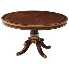 a round wooden table with two pedestals on each side