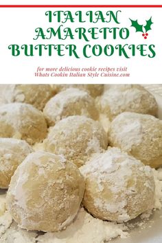 a plate full of cookies with powdered sugar on top and the words italian amarjeto butter cookies above it