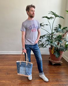 Numbered edition of 3. Constructed from hand selected panels of vintage (100% cotton) denim apparel. Natural full grain vegetable tanned leather that will develop gorgeous patina with use. Handmade in our Omaha, NE studio. Part of our Sustainable Collection. Vintage Everyday Denim Bag, Vintage Denim Tote Shoulder Bag, Upcycled Denim Tote Shoulder Bag, Dark Wash Recycled Denim Tote Shoulder Bag, Eco-friendly Blue Denim Bag, Clean Cotton, Duck Canvas, Denim Patchwork, Upcycled Denim