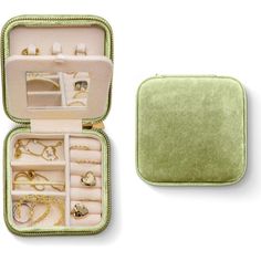 an open green case with jewelry in it on a white background and one opened to show the contents