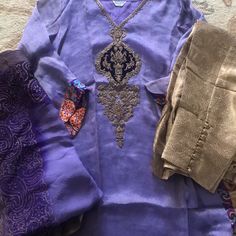 This Is Very Expensive Fabric And Work! Bronze Straight Pants With Button Detail At The Ankle. Long Sleeve Purple Shirt With Bronze/Gold Beadwork. Purple Ombr Duputta With Gold Accents. Brand New! Purple Silk Party Sets, Purple Silk Long Sleeve Salwar Kameez, Purple Silk Sets For Eid, Purple Long Sleeve Salwar Kameez For Formal Occasions, Purple Long Sleeve Salwar Kameez For Formal Events, Elegant Fitted Purple Salwar Kameez, Formal Long Sleeve Purple Salwar Kameez, Formal Fitted Purple Salwar Kameez, Purple Silk Sets For Formal Occasions