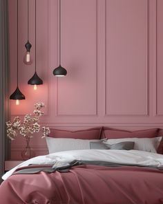 a bedroom with pink walls and white bedding