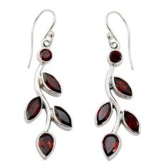 With a promise of flowers scarlet buds spring from winter branches. Shanker crafts this elegant image from sterling silver setting the earrings with faceted garnets the birthstone of January that total 5 carats. .925 Sterling silver Silver Indian Jewelry, Ruby Pendant, Garnet Jewelry, Garnet Earrings, Online Earrings, Silver Earrings Dangle, Handmade Sterling Silver, Hook Earrings, Flower Earrings