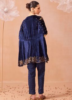 A hand embroidered kurta set embellished with sequins and dabka work paired with pants. Blue Pant Set With Resham Embroidery, Indigo Set With Chikankari Embroidery, Designer Indigo Sets With Chikankari Embroidery, Indigo Sets With Chikankari Embroidery, Anarkali Embroidered Pant Set With Traditional Drape, Indigo Wedding Sets With Dupatta, Festive Pant Set With Chikankari Embroidery And Traditional Drape, Indigo Wedding Set With Dupatta, Wedding Indigo Sets With Dupatta