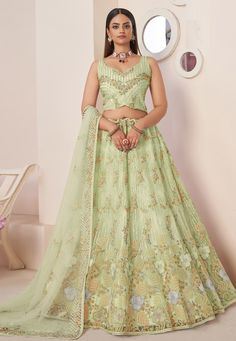 Pista green net sequin lehenga choli online 87009 Desc: Style : Circular Lehenga Choli Color : Pista Green Fabric : Net Work : Sequence Embroidery Wash Care : Dry clean Sleeve Style : Sleeveless Long Sleeves : Done only in Custom Stitch Sleeves Lining : Done only in Custom Stitch Bust Size : 32 to 42 Inches Occasion : Mehendi Reception Ceremonial Baby Shower Teej Vijayadashami Engagement Party Wear. With Express Free Shipping Buy Lehenga - Indian Party wedding and bridal Pi... Pista Color Lehenga, Anarkali Lehenga Gowns, Sequins Lehenga Choli, Umbrella Lehenga, White Lehenga Choli, Sequin Lehenga, Green Lehenga Choli, Bridal Lehenga Online, White Lehenga