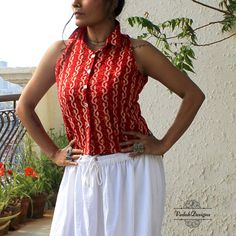 Shop our beautiful store at www.VedahDesigns.com Kindly choose the top fabric from the fabric section link below:- https://www.etsy.com/in-en/shop/VedahDesigns?ref=seller-platform-mcnav&search_query=top+fabric It's a breathable cotton boho top with a buttoned opening. It has a long back, and front short and can be customized as per your need. You can wear it to work, parties, yoga, or casual outings. Color- Red and white  Size measurement - Can be made in any size, please check our size chart from the last picture and share your measurements along with the order. TOP -  Collared neckline, sleeveless.  There are buttons on the placket for opening. We welcome wholesale orders as well. Wholesale is half the price of one piece.  Wash Care Instructions -  Soft gentle wash in cold water in the m Chic Cotton Shirt With Collared Neckline, Chic Cotton Top With Collared Neckline, Chic Cotton Tops With Collared Neckline, Summer Cotton Top With Collared Neckline, Red Cotton Top With Collared Neckline, Red Cotton Tops With Collared Neckline, Fitted Cotton Blouse With Collared Neckline, Casual Cotton Blouse With Boho Collar, Fitted Collared Bohemian Top