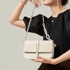 Discover Elegance and Versatility Step into the season with sophistication using our exclusive White Leather Crossbody & Shoulder Bag. Designed for the fashion-forward woman, this bag embodies elegance and versatility, perfectly complementing your spring and summer wardrobe. Whether you're attending a daytime event or an evening soiree, this bag seamlessly adapts to all occasions, ensuring you always step out in style. Premium Quality and Design Crafted with genuine cow leather, this bag boasts a soft, luxurious texture that's both durable and stylish. The saddle shape design, combined with a solid pattern and a flap pocket exterior, offers a classic yet contemporary look. Its multiple interior compartments, including a slot pocket, zipper pocket, and a spacious main compartment, provide a Luxury Formal Bag With Single Shoulder Strap, Luxury Single Shoulder Strap Bag For Formal Occasions, Luxury Single Shoulder Strap Formal Bag, Luxury Satchel Flap Bag With Single Shoulder Strap, Luxury Flap Satchel Bag With Single Shoulder Strap, Luxury Baguette Shoulder Bag With Single Strap, Luxury Baguette Bag With Single Shoulder Strap, Luxury Flap Shoulder Bag With Single Strap, Luxury Satchel Bag With Single Shoulder Strap