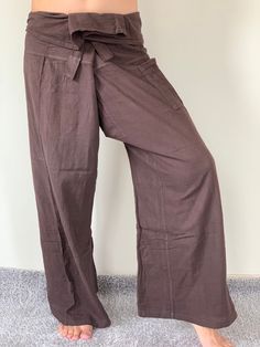 "Unisex Thai fisherman pants. One size fits all. You can wear in many occasions, casual wear, yoga wear, relax at home, travel etc. If you are looking for some pants that you can wear everywhere, comfortable, relax and Easy to wear. Thai fisherman pants is Answer!! Nice gift for yourself or your lover One pocket on the side for storing your items such as wallets, mobile phones, etc Approx. Measurements: One size can fits most and 1 Pockets Waist around 51\" (Wrap Pants) Length 45\" Lower Leg 14\ Beach Cotton Harem Pants In Solid Color, Beach Cotton Harem Pants, Beach Harem Pants In Solid Cotton, Beach Wide Leg Cotton Pants, Cotton Cargo Pants With Pockets For Beach, Beach Cotton Cargo Pants With Pockets, Beach Cotton Pants With Pockets, Solid Color Cotton Yoga Pants For Summer, Cotton Pants For The Beach