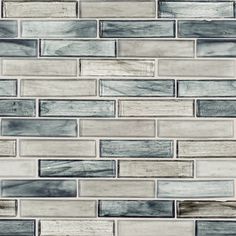 a gray and white tile backsplash