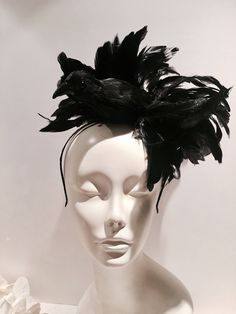 "Black Bird fascinator- Halloween- Feather Headband- Kentucky Derby- Ravens- Crow- Horse race- Mad Hatter Hello, I have one made so it can ship within a day or two. This fascinator is perfect to add whimsy and is just so fun you'll be the life of the party. A great conversation piece Most people while talking to you don't notice the bird at first and then all of a sudden they say,\" oh my God you have a bird on your head !\" This black feather fascinator has a black feather bird with a puff of b Black Bird Costume Women, Black Fascinator For Halloween Party, Black Feathered Top Hat For Party, Black Party Hat With Feather Trim, Black Halloween Party Fascinator, Party Black Top Hat With Feathers, Adjustable Black Top Hat With Feathers, Whimsical Black Costume Hats And Headpieces For Parties, Whimsical Black Costume Accessories For Party