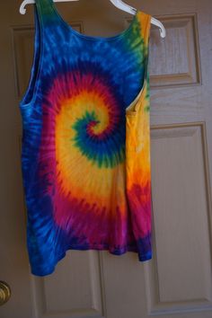 "Vintage size XL tie dye tank top. Measurements taken across front lying flat 26\" across front armpit to armpit -doubles to 52\" 28\" length Ready to ship!!" Rainbow Sleeveless Top For Summer, Tie-dye Cotton Tank Top, Acid Wash Hand Dyed Sleeveless Top, Hand Dyed Acid Wash Sleeveless Top, Acid Wash Hand-dyed Sleeveless Top, Cotton Tie Dye Tank Top For Festivals, Cotton Tie-dye Tank Top For Festival, Tie Dye Cotton Sleeveless Tank Top, Tie Dye Sleeveless Tank Top For Summer