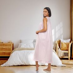 Step into a world of timeless elegance with the Alexander Del Rossa Women's Victorian Nightgown. This sleeveless, button-up gown is a perfect blend of comfort and vintage charm, crafted from 100% cotton poplin that is both soft and breathable, ensuring a good night's sleep.

- Material: 100% Cotton Poplin
- Color: White Floral on Mauve
- Size: Large
- Gender: Female
- Age Group: Adult
- Features: Sleeveless, Button-Up Front with 8 Pearl Shell Buttons, Lace Trim, Pintucks, Deep Pockets, Ruffled C Feminine Sleeveless Sleepwear For Night, Feminine Sleeveless Bedtime Dress, Feminine Sleeveless Dress For Sleepover, Feminine Sleeveless Sleepwear, Sleeveless Cotton Night Dress, Feminine Sleeveless Sleepwear For Bedtime, Vintage Night Dress, Long Night Dress, Cotton Nightgowns