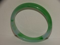 "The Best Quality Hand Carved Jadeite Jade Bangle Bracelet, 2\" inch inner diameter, 2 1/2\" inch outer diameter, 6.5\" inch inner diameter, probable a perfect size 5 to 6\" inch lady wrist size. In excellent condition." Luxury Green Jade Bangle, Handmade Round Jade Bangle, Hand-strung Jade Crystal Bracelet, Hand-strung Round Jade Bracelets, Jade Bangle Bracelet, Hand-strung Green Jade Bracelets, Jade Bangle, Vintage Lucite, Houston Tx