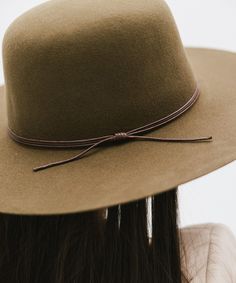 Rue is a sophisticated, classic open crown shape with a structured semi-wide brim. This is the only hat featuring hand-stitched detailing on the brim's edge for a subtle, distinctive touch. Included is a tonal triple-strand waxed leather band that is both adjustable + removable for styling. Classic Wide Brim Felt Hat For Everyday, Classic Wide Brim Boater Hat For Fall, Fall Flat Brim Sun Hat, Fall Sun Hat With Flat Brim, Classic Adjustable Cloche Hat With Curved Brim, Classic Spring Felt Hat For Rodeo, Brown Flat Crown Felt Hat For Spring, Classic Unlined Hat With Flat Brim, Rigid Brimmed Winter Hat