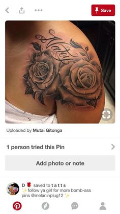 the back of a woman's stomach with roses on it and an inscription that reads,