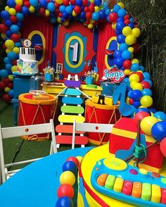 a birthday party with colorful balloons and decorations