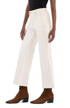 Cropped at the ankles for a fresh look, these stretchy wide-leg jeans feature a sleek wash and seamed front. 27" inseam; 23" leg opening; 10 1/2" front rise; 15" back rise (size 8) Zip fly with button closure Front patch pockets; back patch pockets 98% cotton, 2% spandex Machine wash, tumble dry Imported Chic Beige Cropped Wide Leg Pants, Wide Leg Flare Jeans In Beige With Five Pockets, Beige Wide Leg Flare Jeans For Work, Beige Cropped Wide Leg Pants For Work, Beige Cropped Leg Wide Pants In Cotton, Beige Cotton Cropped Wide Leg Pants, Beige Cropped Wide Leg Cotton Pants, Chic Cream Wide Leg Flare Jeans, Cream Wide Leg Flare Jeans For Fall