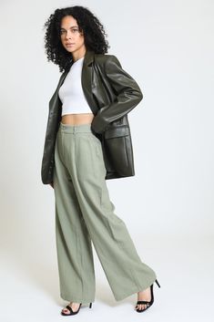 Step into effortless elegance with our Pleated Wide Leg Trouser in Sage Leaf. These trousers are designed to elevate your wardrobe with their chic and comfortable fit, making them an essential addition for any fashion-forward individual. Key Features: Fabric Contents: Crafted from a luxurious blend of 55% Linen and 45% Rayon, these trousers offer breathability and softness, ensuring you stay comfortable throughout the day. Stylish Design: The pleated wide leg silhouette not only flatters your fi Effortless Wide Leg Workwear Pants, Effortless Wide Leg Straight Pants For Work, Effortless Wide Leg Workwear Pants With Pockets, Green Wide Leg Pants For Business Casual, Green Wide Leg Casual Pants For Business Casual, Tailored Wide Leg Pants For Fall, Tailored Wide Leg Pants For Spring, Versatile Tailored Wide Leg Pants For Spring, Casual Tailored Wide Leg Pants For Fall