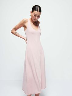 With a chic U neck, cross back straps with a keyhole cutout, and a built-in self shelf bra, this dress gives an effortlessly feminine feel. It's the midi dress you'll wanna wear everywhere. (This one comes in Violet Ice.) | Women's Merethe Midi Dress in Violet Ice | Ethical Essentials Spring Dress With Cutout And Cross Back, Spring Dresses With Cutout And Cross Back, Strappy Back Maxi Dress With Back Opening For Spring, Spring Maxi Dress With Strappy Back Opening, Summer Dresses With Cutout And Cross Back, Spring Dresses With Keyhole And Strappy Back, Chic Fitted Maxi Dress With Cross Back, Backless Maxi Dress For Daywear, Spring Chic Scoop Neck Maxi Dress