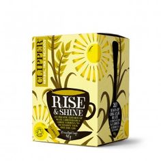 a box of coffee that is yellow and has the words rise and shine on it