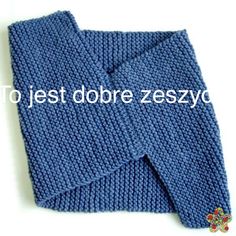 a blue knitted sweater sitting on top of a white surface with the words, to jest dobre zesyc