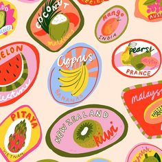 a bunch of fruit stickers on a pink background