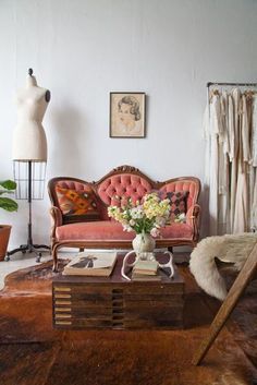 a living room filled with furniture and decor