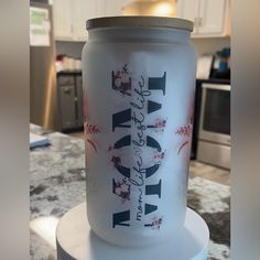 a glass jar sitting on top of a counter