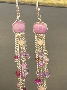 These are a pair of beautifully handcrafted one of a kind lavender amethyst rectangular focal beads, round rose quartz, and crystal dangle chandelier earrings.  These earrings measure at a total of 3 1/2 inches. They close with sterling silver lever backs earring wire. Amethyst And Rose Quartz, Lavender Amethyst, Quartz Gemstones, Earring Wire, Different Shades Of Pink, Focal Beads, Rose Quartz Gemstone, Amethyst Purple, Design Jewelry