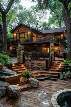 an outdoor deck with steps leading up to a hot tub in the middle of it