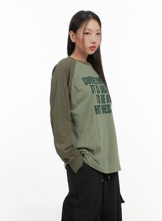 Product Detail Style : Street, Acubi Occasion : Back to school Type : TShirts Print : Lettering Material : Cotton Sleeve : Long sleeve Neck : Raglan Fit : Loose fit Cotton100 Color : White, Dark green, Dark brown Made in Korea Model Size Model is wearing size S/M and the color Dark green. Height : 5'5" | 166cm / Top : S / Bottom : S (25 inch) .prddescription table, .prddescription td, .prddescription th { border : 1px solid black; border-collapse : collapse; padding: 10px; } Size(Inch) Size Shou Urban Style Long Sleeve Tops With Letter Print, Casual Khaki Tops, Casual Khaki Tops With Letter Print, Urban Green Top With Letter Print, Casual Long Sleeve Cotton T-shirt, Casual Khaki Sweatshirt Relaxed Fit, Urban Style Long Sleeve Letter Print Tops, Relaxed Fit Tops For College Style In Fall, Casual Brown Tops For College