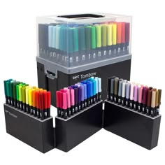 a display case with markers and pens in it