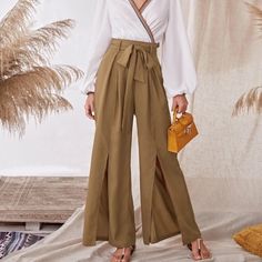 These Pants Are A Must Have! Size M But Would Likely Also Fit A S Size Xl Would Fit A 10 Or 12 Insanely Flattering... I Wish They Would Have Fit Me! Split Leg And Wide Flare With Bow Detail Split Pants, Leg Split, Split Legs, Type Of Pants, Colorful Boho, Pants Color, Lingerie Sleepwear, Split Hem, Color Khaki