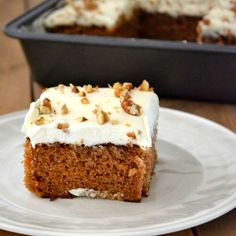 a piece of carrot cake on a white plate